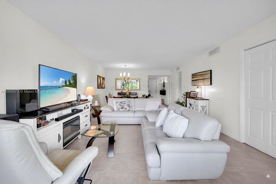 Welcome to this beautifully remodeled 2-bedroom, 2-bathroom condo in the desirable Palm Aire community! Located on the first floor, this stunning home boasts breathtaking views of the golf course right from your private patio. Perfect for enjoying Florida's beautiful weather and serene surroundings. This unit features updated kitchen, new electric panel, SS appliances, quartz countertops, and lots of storage. The spacious living area is perfect for entertaining or relaxing. Both bedrooms are generously sized with plenty of closet space both with their own private bathrooms. Washer and dryer in unit! Palm Aire offers great amenities, including multiple pools, fitness center, walking pathways, and easy access to the golf course.
