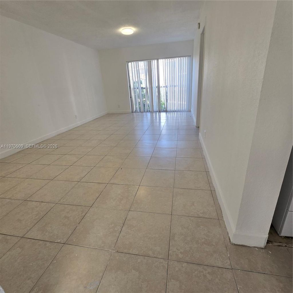 Photo of 8740 N Sherman Cir #308, Miramar, FL 33025 (MLS # A11970509)