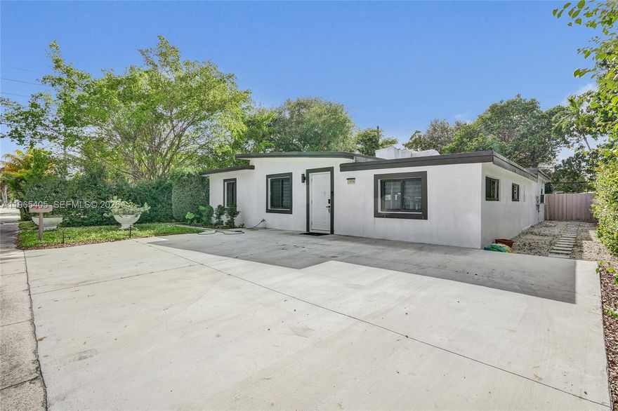 Beautifully updated and impressively spacious 4-bedroom, 3-bathroom single-family home offering the perfect blend of style, comfort, and privacy. From the moment you walk in, soaring vaulted ceilings and contemporary flooring create a bright, open atmosphere that feels both elegant and inviting.
Designed with modern living in mind, the open-concept layout seamlessly connects the living, dining, and kitchen areas—ideal for entertaining or relaxing in style. The newly renovated kitchen shines with sleek white soft-close cabinetry, stainless steel appliances, and a clean, modern aesthetic that’s sure to impress.
Every bedroom is exceptionally large, featuring generous walk-in closets and beautifully remodeled bathrooms. The split floor plan provides added privacy, making it perfect for families or guests. Enjoy peace of mind with major upgrades already completed, including a newer AC system, updated electrical, a brand-new roof, and impact windows and doors throughout.
Step outside to your fully fenced backyard oasis, complete with mature mango and avocado trees and plenty of room to design the pool of your dreams. With easy access to I-95 and just minutes from Miami’s hottest dining, shopping, and entertainment spots, this home truly offers the best of space, style, and location!