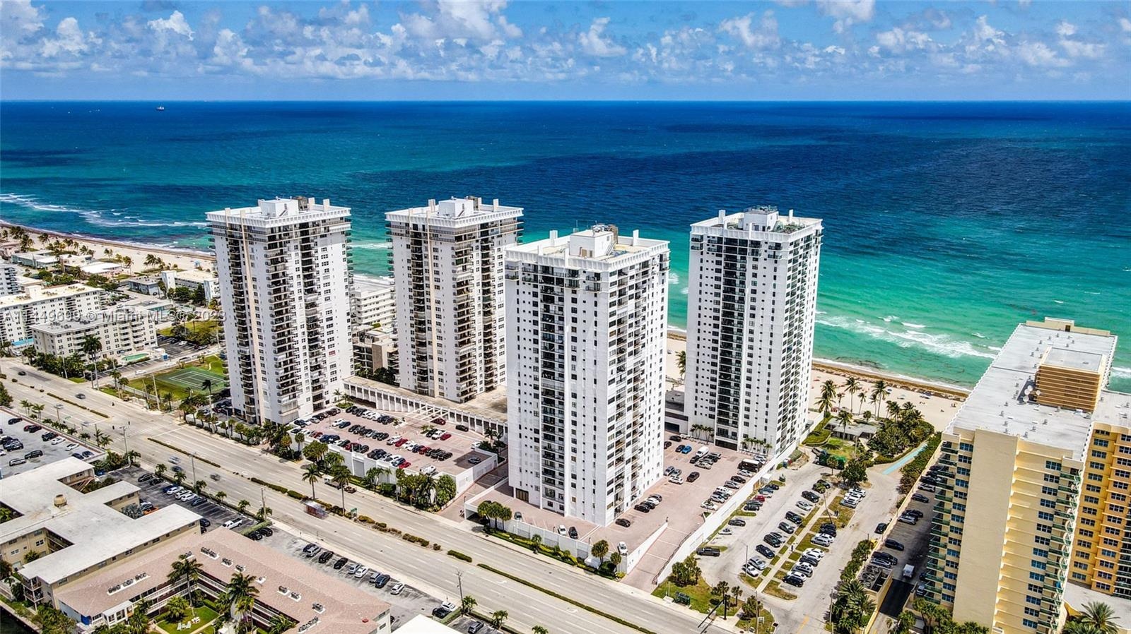 Indulge in a world where every sunrise & sunset becomes your private movie, courtesy of the breathtaking views from the balcony of this condo. Overlooking the tranquil intracoastal & ocean, this unit at the Quadomain Britannia boasts the pride of an original owner. Experience the lifestyle of 5-star amenities, including 2 heated pools, beach chair & umbrella service, updated elevators, lobby, hallways & oceanside restaurant, 24-hour concierge service, guest parking, fitness center, ballroom, business center, billiards room, saunas & other incredible features located centrally on Hollywood Beach. Publix being built nearby, incredible access to i-95, FLL Airport, Aventura Mall, Gulfstream Racetrack & Port Everglades. Imagine your toes in the sand, in just minutes! Tenant Occupied until 2025.