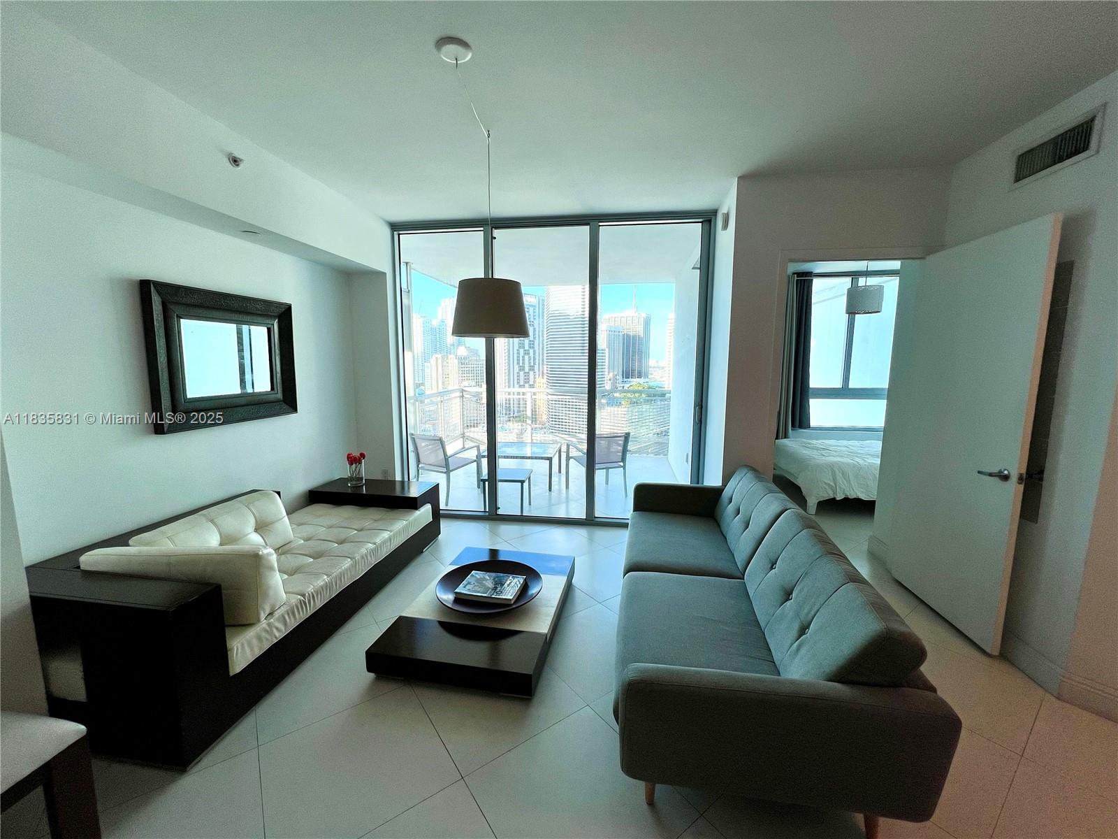 Don't miss this beautiful 2 bedroom/2 bath + den. Modern kitchen with lots of cabinets space. Bathrooms also have lots of storage. Washer and Dryer in unit. Ceramic floors throughout with 2 huge balconies with stunning views of the city skyline. Right off I-95, and walking distance to BCC (Brickell City Center). You can also walk to to the Kaseya or the Arsh Center or take the Metro-mover or train.
The building offers pool and jacuzzi, fitness center and racquetball court, spa, movie theater, kids playroom, and much more.
Option to get all furniture.