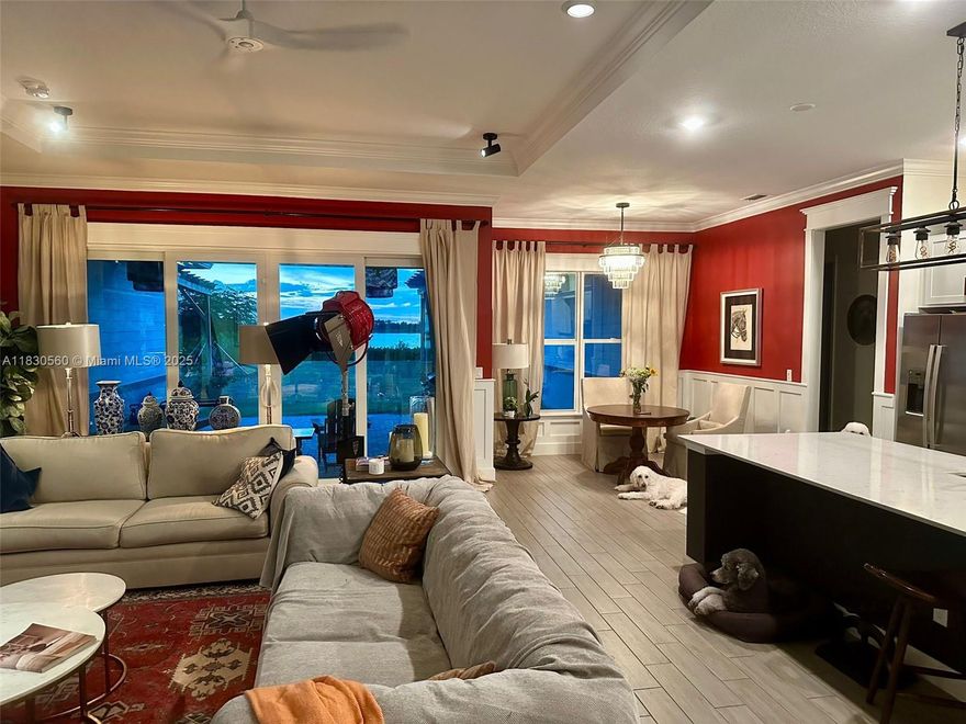 Welcome to the house you have always dreamed off. This home is in the exclusive and coveted Arden Neighborhood. It features a gated entry and 24 hours security. Waterfront house with 4 Bedrooms 3 1/5 Bathrooms and Den, 3 cars garage on one of the largest lot on the Lake (0.45 acres). Lot is fenced with aluminum and clusias all around the property. Wood tile, State of the art Bookshelf on Living room and Island Kitchen. Crown Molding and Paneling. Premium Samsung Smarthing Washer and Dryer on Laundry room, Pergola on patio looking to the Lake. Schedule a showing and come see it !