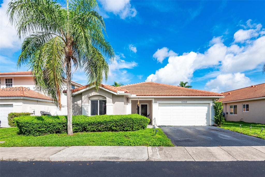 Photo of 12519 NW 10th Ct, Sunrise, FL 33323 (MLS # A12096129)