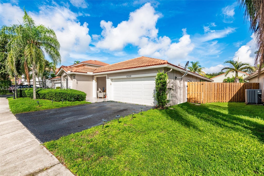 Photo of 12519 NW 10th Ct, Sunrise, FL 33323 (MLS # A12096129)