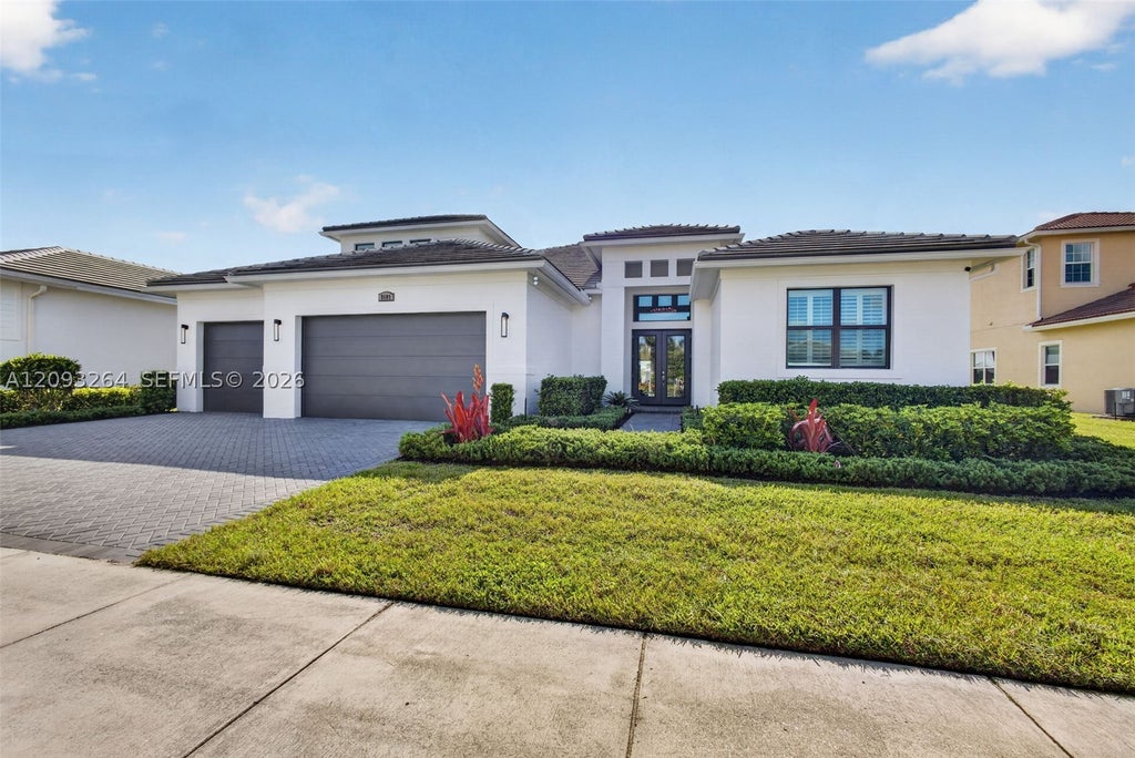 Photo of 8609 SW Felicita Way, Port St Lucie, FL 34987 (MLS # A12093264)