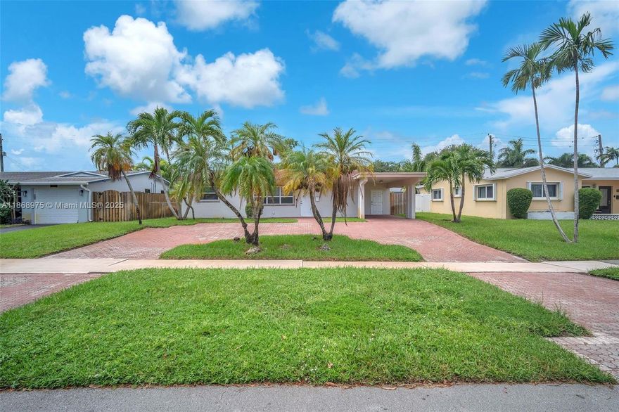 Stunning 2-bed, 2-bath Hollywood Heights home, completely renovated with modern finishes, including an open-concept kitchen, quartz counters, and dark laminate flooring. Enjoy hurricane-impact windows and doors, French doors opening to a spacious fenced backyard, and ample parking with a circular driveway and carport. Located in a serene, safe neighborhood within walking distance of the YMCA, Yellow Green Farmers Market, and Rotary Park. Convenient to schools, shopping, the beach, airport, transit, and I-95. 1 pet up to 30 lbs allowed with a pet deposit. Completely move in ready, is a perfect place to call home.