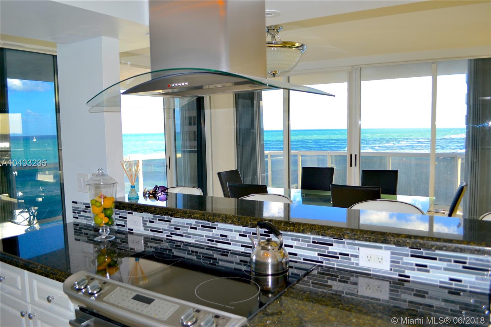 Gorgeous direct oceanfront condo at Sands Pointe in Sunny Isles. It boasts a remodeled open kitchen with stainless steel appliances, granite counters and wine cooler. Marble flooring throughout living areas & carpeting in bedrooms, W/D and built out closets in every room. Modern furniture and unique furnishings throughout. Endless ocean views from every single room and the expansive wraparound terrace. Sands Pointe is a full service building with pool, gym/spa, 24/7 concierge, valet and beach service.