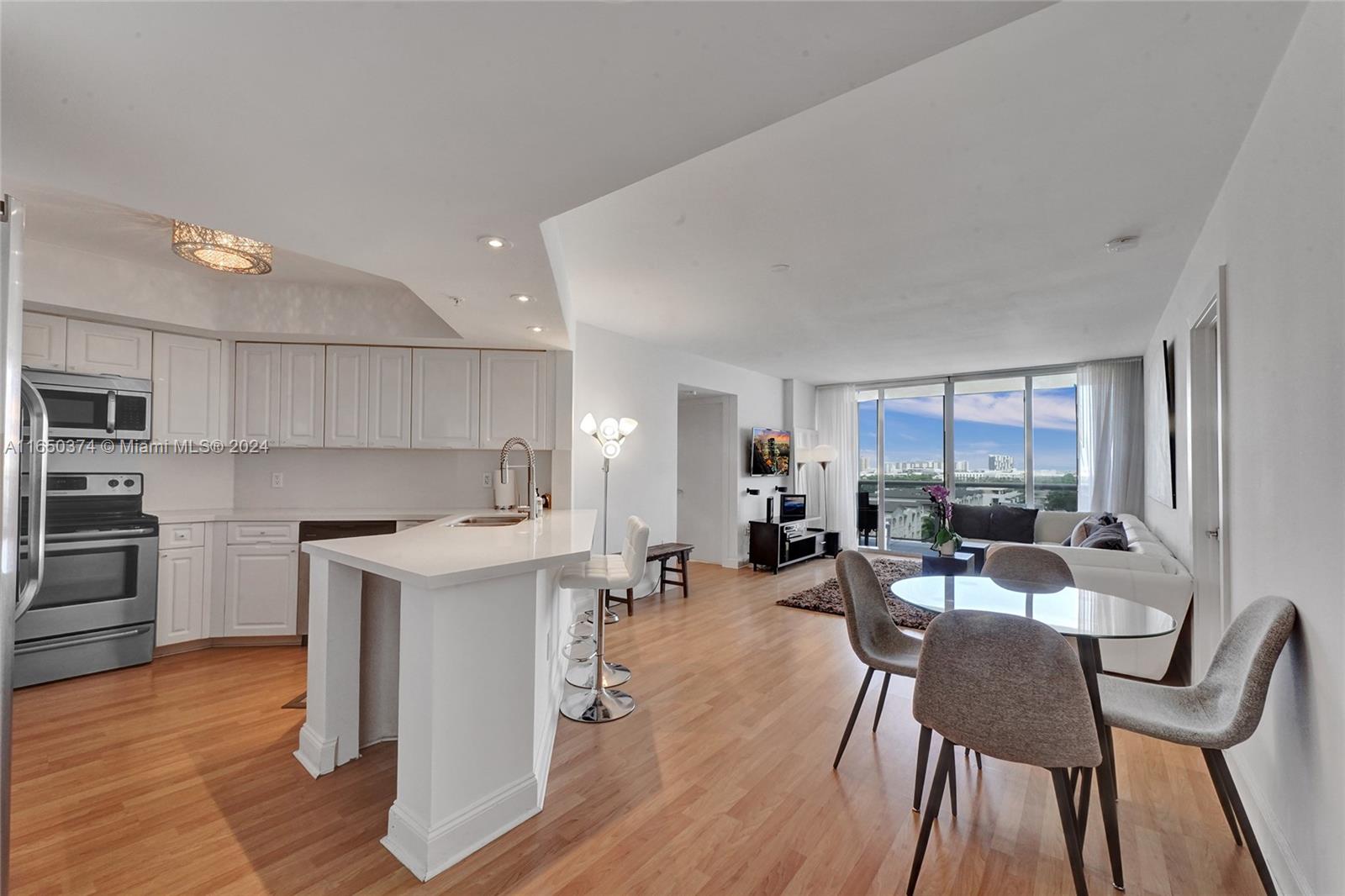 Wonderful 2-bedroom, 2-bathroom condo in Sunset Harbour features a split floor plan and is offered fully furnished! Enjoy spectacular views from your extended balcony, a renovated lobby, in-unit washer/dryer and convenient valet services. Move in ready, flexible terms and easy to show!