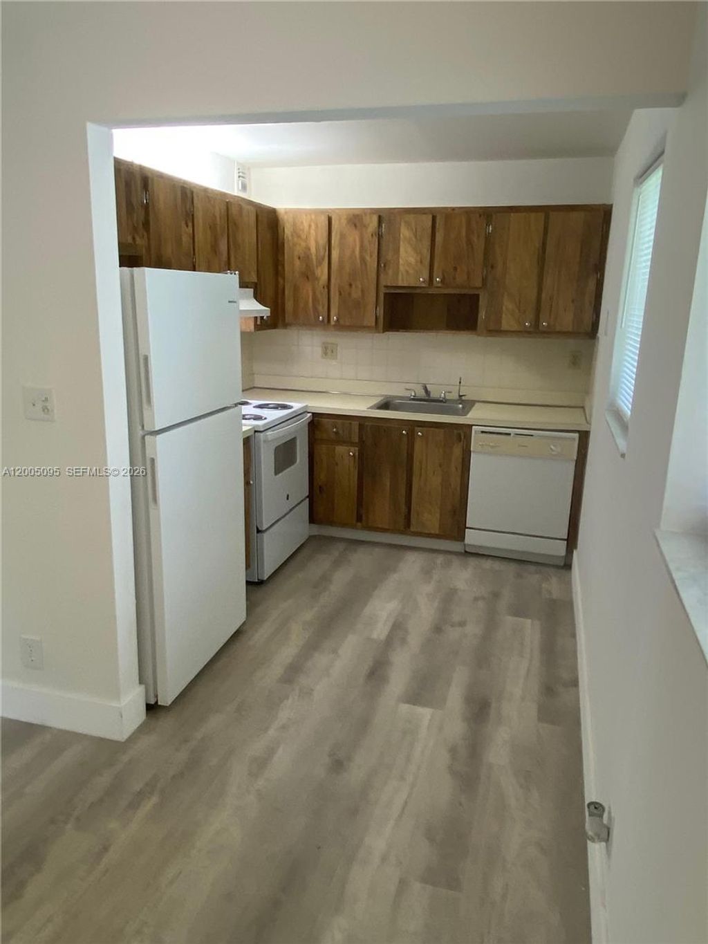 Photo of 9920 NW 68th Pl #202, Tamarac, FL 33321 (MLS # A12005095)