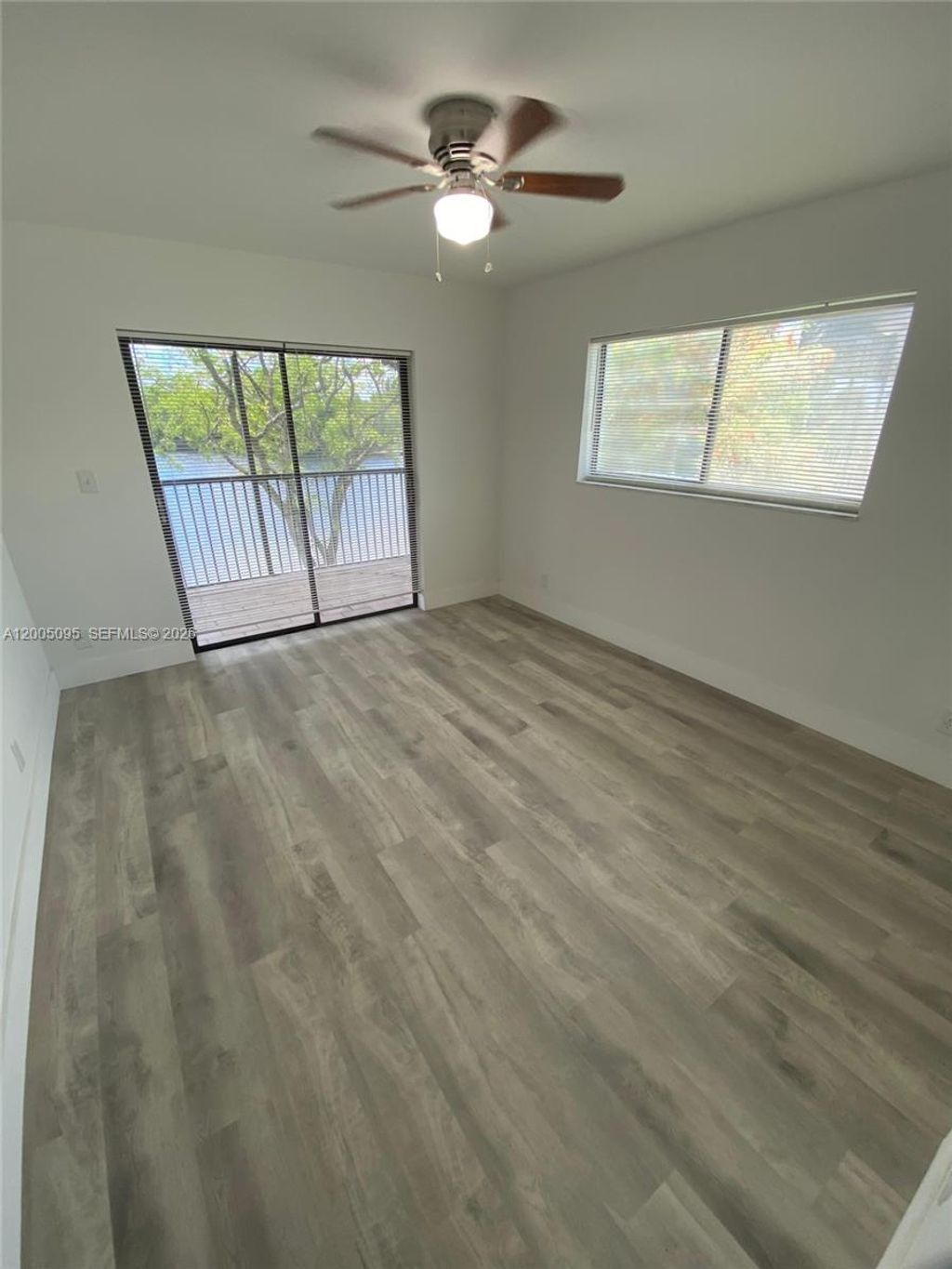 Photo of 9920 NW 68th Pl #202, Tamarac, FL 33321 (MLS # A12005095)