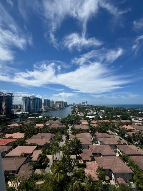Experience the essence of Sunny Isles Beach from this chic 1-bedroom, 1.5-bath loft-style penthouse. With sun-drenched interiors, and captivating city and partial ocean vistas, this residence blends style, comfort, and coastal elegance. Enjoy your morning coffee with sweeping views from the upstairs terrace or unwind in the bright, open living area below. The building offers gate nice amenities and a couple tennis courts. Just steps from pristine beaches, upscale shops, and dining. Tenant in place, perfect scenario for an investor.