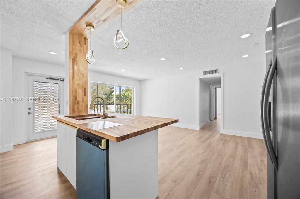 Photo of 7511 S Oriole Blvd #201, Delray Beach, FL 33446 (MLS # A11967700)