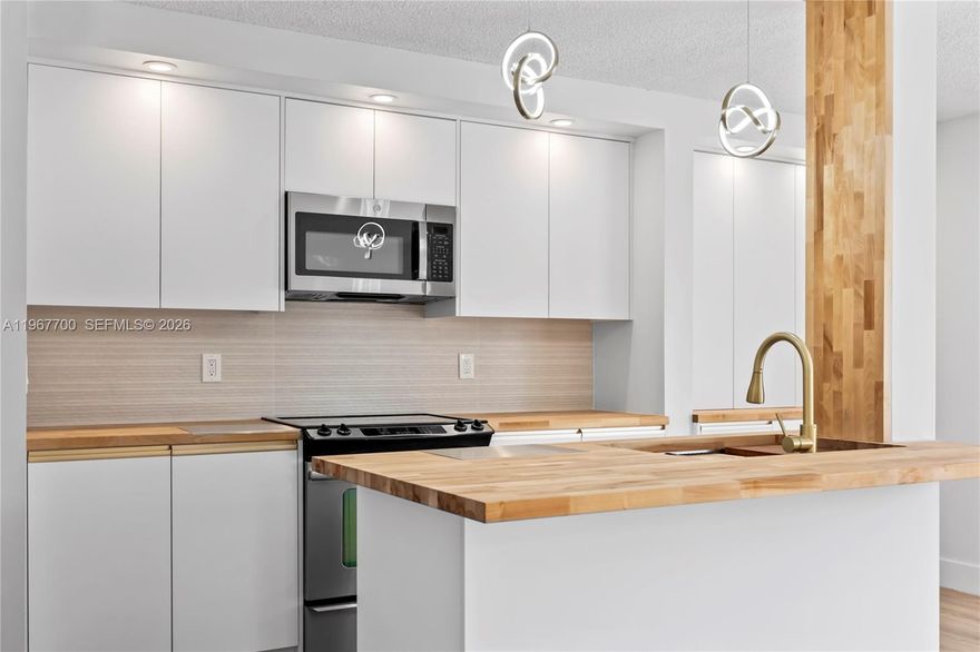 Discover this fully renovated 2-bedroom, 2-bath residence offering true turn-key living in a desirable 55+ community. Completed in 2026 and never lived in since, buyers will be the first to enjoy every brand-new upgrade. Designed for comfort and style, the open-concept kitchen flows seamlessly into the living area and showcases brand-new appliances and beautiful wood countertops. Laminated flooring runs throughout, paired with elegantly finished walls and abundant natural light that creates a bright, welcoming atmosphere. The bathrooms have been tastefully modernized, and generous walk-in closets provide ample storage space. Enjoy your private screened balcony with a direct pool view