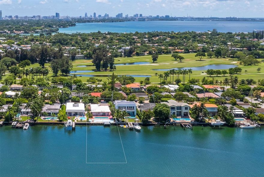 INCREDIBLE OPPORTUNITY/PRICE REDUCTION OVER $500K. Build your waterfront dream home in the exclusive golf-gated community of Normandy Shores. Just 15’ from Bal Harbour, South Beach & Wynwood, one of the most desirable waterfront luxury living spots in Miami Beach. 10,200 SF lot w/ breathtaking water views & 60 ft of water frontage can accommodate a 5,000 SQFT, 2 story residence, w/ 5bd/5ba, chef kitchen, family/media rooms, 2 car garage & more. Enjoy your private pool, secluded garden, summer kitchen & boat dock. LUXURY WATERFRONT LIVING AT ITS BEST. Rent the existing 2,394 SF, 3B/2B home while you create your masterpiece. PROJECT, ARCHITECTURAL PLANS & PERMITS ARE NOT INCLUDED. Renders are courtesy of H2 Construction, a Design, Build & Development firm w/multiple developments in Normandy.
