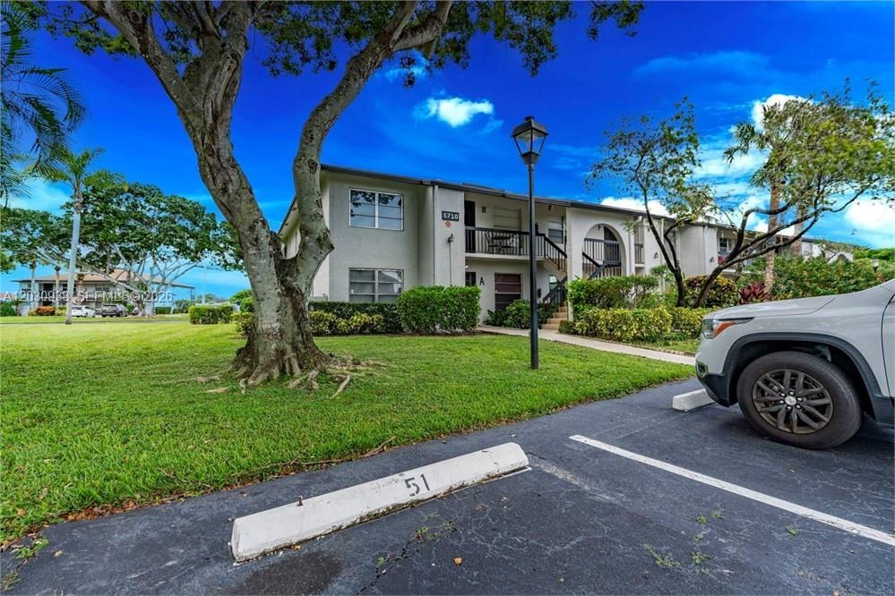 Photo of 5710 Princess Palm Ct #A, Delray Beach, FL 33484 (MLS # A12030933)