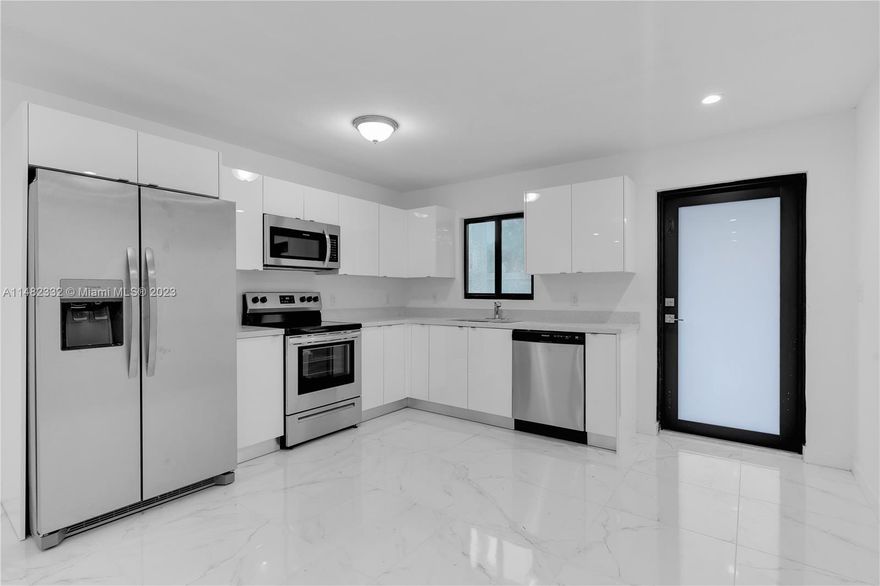 This brand New Construction Twin Home is MOVE IN READY. Boasting 3 spacious bedrooms, 2 bathrooms, and 1,200 sqft of comfortable living space. The property stands out with its high-quality finishes, including porcelain tiles, white wood kitchen cabinets, quartz countertops, and the added security of impact windows and doors. *Pictures are of a similar recently completed model*