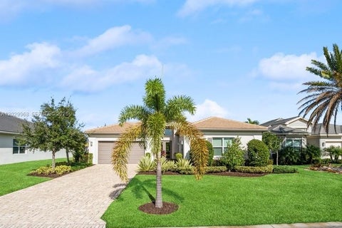 Photo of 10729 SW Matisse Ln, Port St Lucie, FL 34987 (MLS # A12029968)