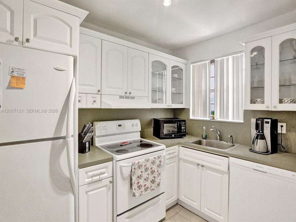 Photo of 2040 NW 81st Ave #117, Pembroke Pines, FL 33024 (MLS # A12017133)