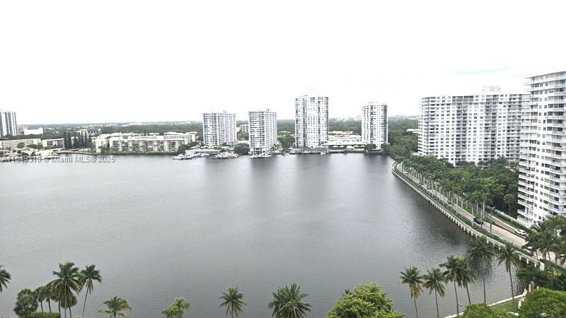 Spacious, bright, and remodeled 2 bed / 2 bath condo with 1,322 SF on the 18th floor of Biscayne Cove. Enjoy stunning south-facing views of the bay, ocean, and skyline from your private balcony. Features include tile flooring throughout, wood laminate in bedrooms, a remodeled kitchen with granite countertops, and updated bathrooms. Oversized primary suite with floor-to-ceiling windows. Includes 1 covered parking space. Resort-style amenities: valet, 2 pools, fitness center, tennis, racquetball, basketball, sauna, hot tub, party room, and 24-hr gated security. Located in an A+ school district close to Aventura Mall, worship, beaches, and Gulfstream Park. Easy to show!