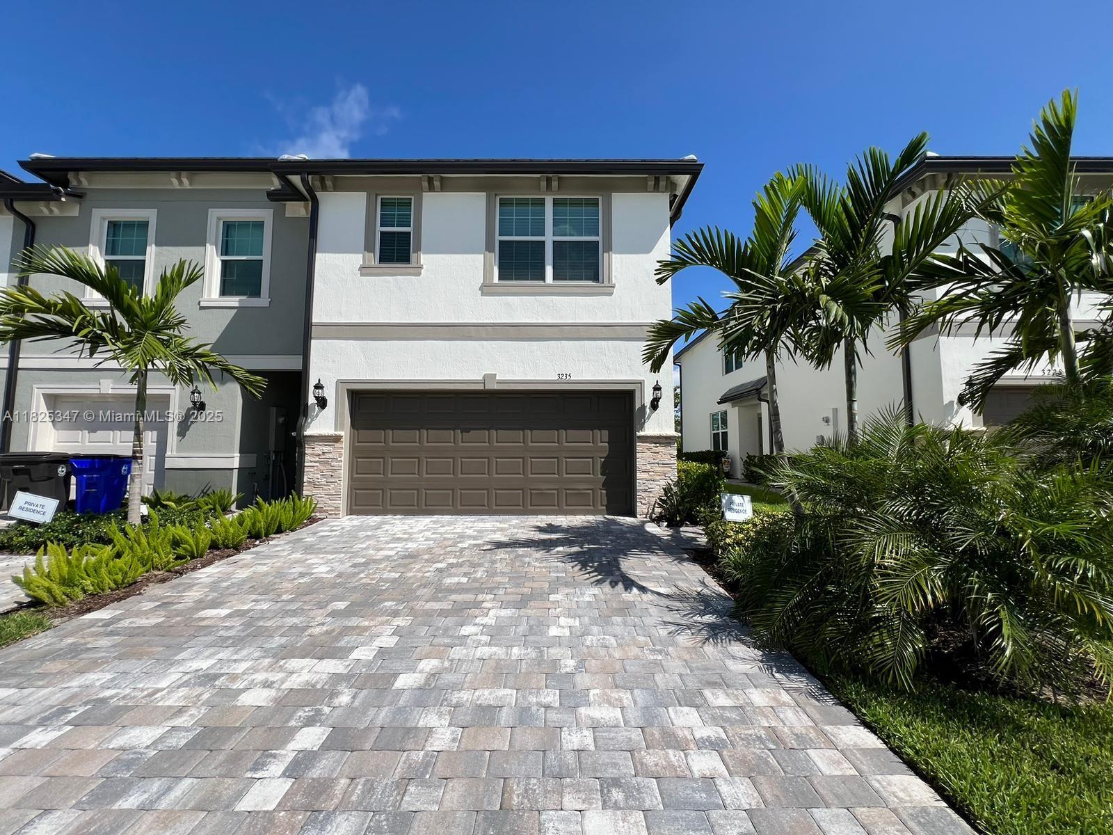 This is your opportunity to live in a modern, newly constructed townhouse in Lauderdale lakes! This spacious property features 3 bedrooms, 2 full bathrooms, and a half bathroom, perfect for comfortable and functional living. With a contemporary design and high-quality finishes, every corner of this townhouse is crafted to offer maximum comfort. The home includes an open-concept kitchen ideal for family gatherings or entertaining friends, and a spacious living-dining area. Additionally, it boasts a two-car garage providing ample parking and storage space. Conveniently located just minutes away from publix and more, easy access to I-95 and Turnpike. Close to Hard Rock Hotel, Inter Miami CF Stadium, sawgrass mall, beaches, FLL airport. INTERNET INCLUDED WITH THE RENT. READY TO MOVE IN.