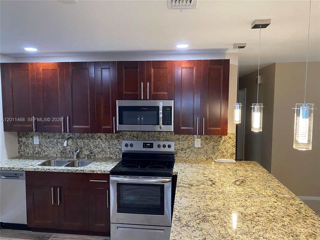 Photo of 2421 SW 6th St, Fort Lauderdale, FL 33312 (MLS # A12011468)