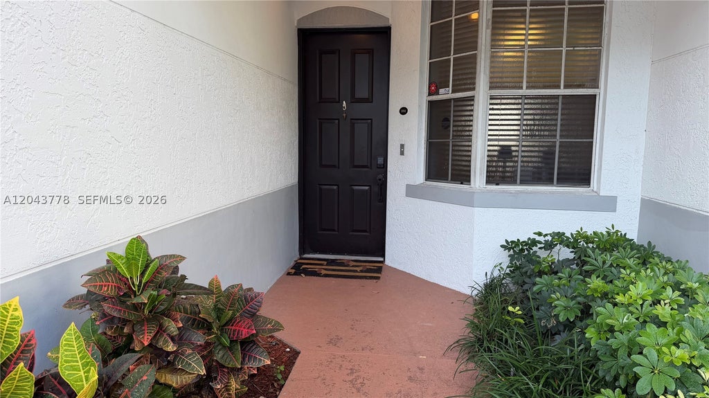Photo of 735 SW 148 Ave #1711, Sunrise, FL 33325 (MLS # A12043778)