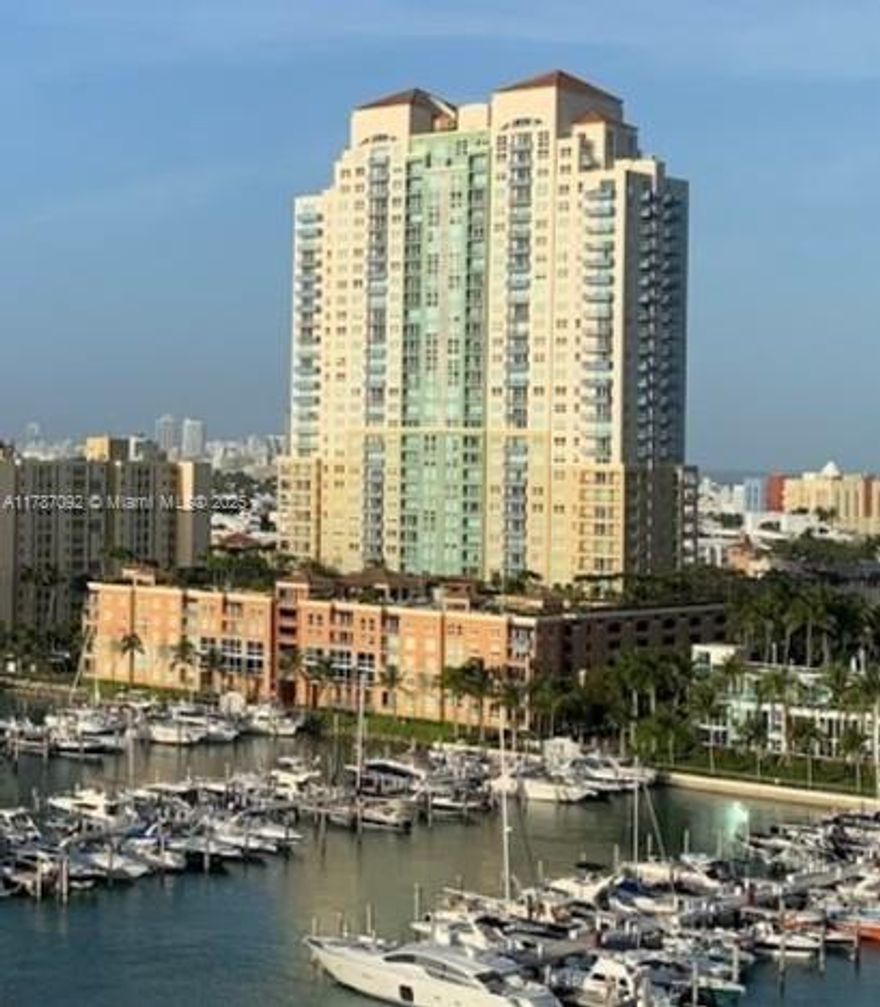 Rarely available South of Fifth town home offering the rare blend of single-family home privacy and luxurious condominium amenities.  perfect blend of privacy, space, and resort-style amenities. This 2 story corner unit features a private entrance, parking and an expansive layout with abundant natural light. Enjoy 2 bedrooms with en-suite baths, including a spacious primary suite with a private balcony and spa tub. The open kitchen is equipped with sleek countertops and bar seating, perfect for entertaining. Bayside pool, tennis court, gym, BBQ area, recreational & events room,  marina access, and more. Pet Policy: Up to 2 pets, max 50 lbs each. Just blocks from South Pointe Park, the beach,fine dining, and everything SoFi has to offer!