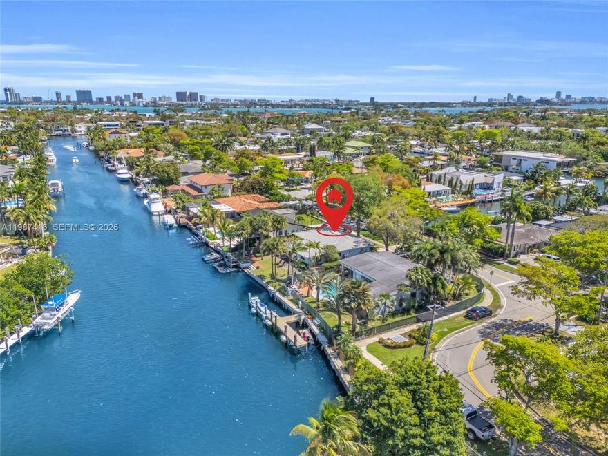 Rare opportunity to create your waterfront dream in prestigious Keystone Point, a gated enclave in North Miami known for privacy and security. Situated on approximately 75 feet of prime deepwater frontage along a wide canal, this property offers direct ocean access with no fixed bridges, making it ideal for boating enthusiasts.

The existing 3-bedroom, 2-bath residence spans 1,872 square feet and features a spacious patio and yard, providing the option to enjoy as-is, renovate, or build a custom estate tailored to your vision. Whether you are a developer, builder, or end user, the potential here is undeniable.

Located in one of the area’s most desirable neighborhoods, just minutes from Biscayne Boulevard, Aventura, Bal Harbour, world-class beaches, dining, major roadways, and close proximity to places of worship, this property combines unmatched convenience with the tranquility of secluded waterfront living.