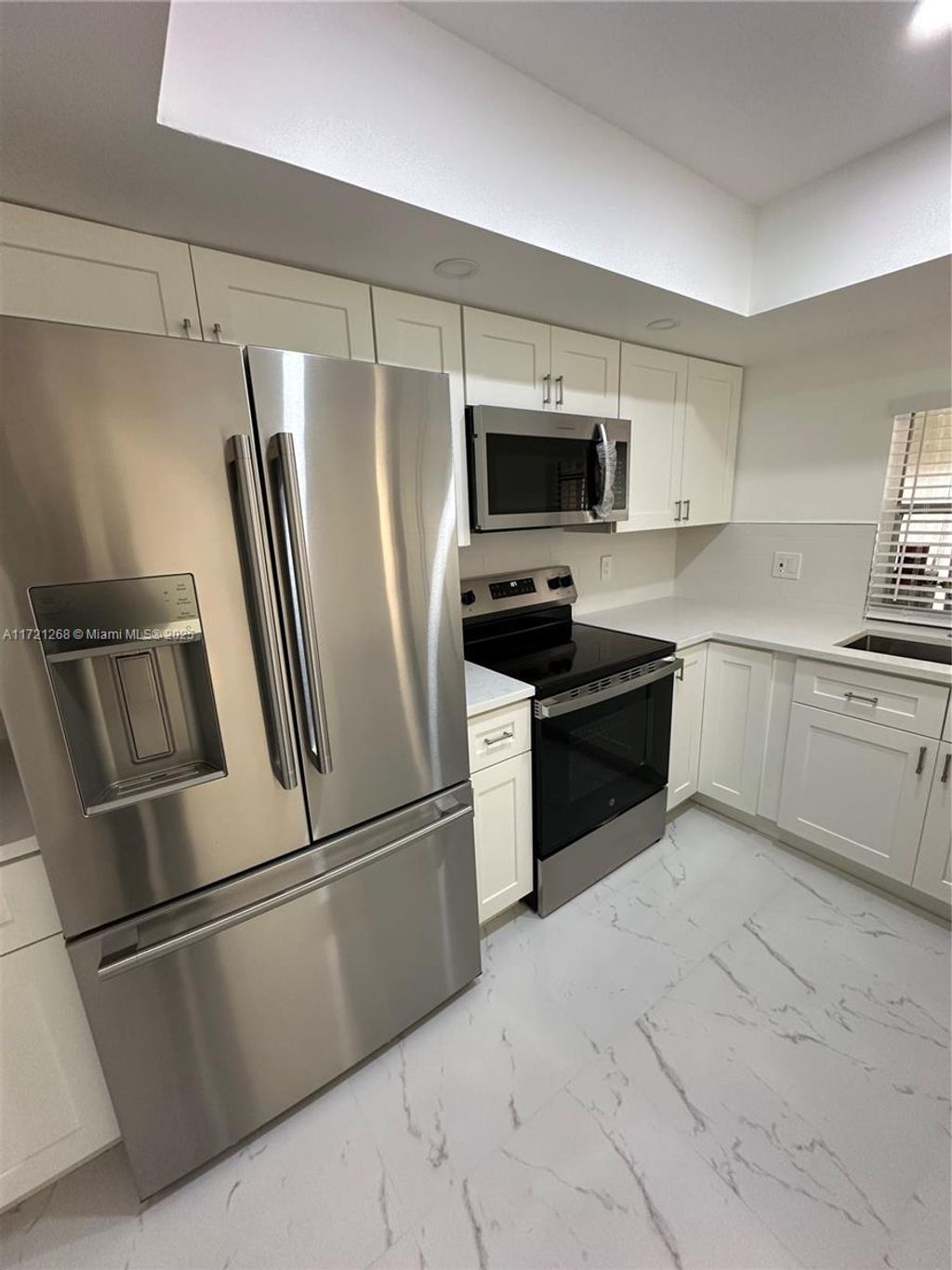 Photo of 4406 Country Grove Blvd #7, Lake Worth, FL 33406 (MLS # A11721268)