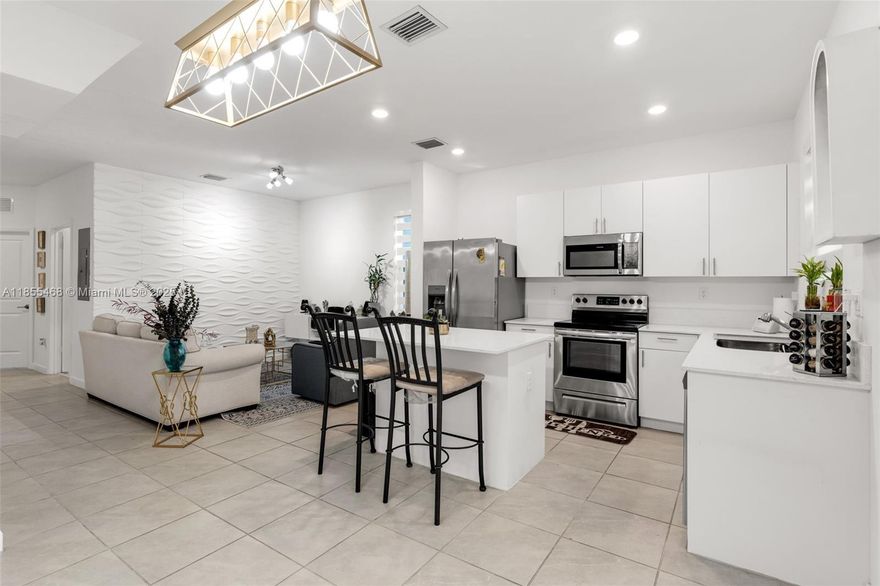 Discover your new home a brand new construction townhome located in a vibrant community in Homestead! This spacious home features 3 bedrooms and 3 bathrooms an open-concept layout is perfect for entertaining or relaxing, with abundant natural light creating a warm ambiance. The contemporary kitchen boasts stainless steel appliances, making meal preparation a delight. For added convenience, a washer and dryer are included right inside the unit, simplifying your laundry routine. Enjoy the amenities of this fantastic community, which includes a clubhouse and a community pool just a short walk across the street. Schedule your showing today and make this beautiful space your new home!