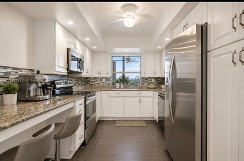 Photo of 1000 Parkview Dr #715, Hallandale Beach, FL 33009 (MLS # A12070748)