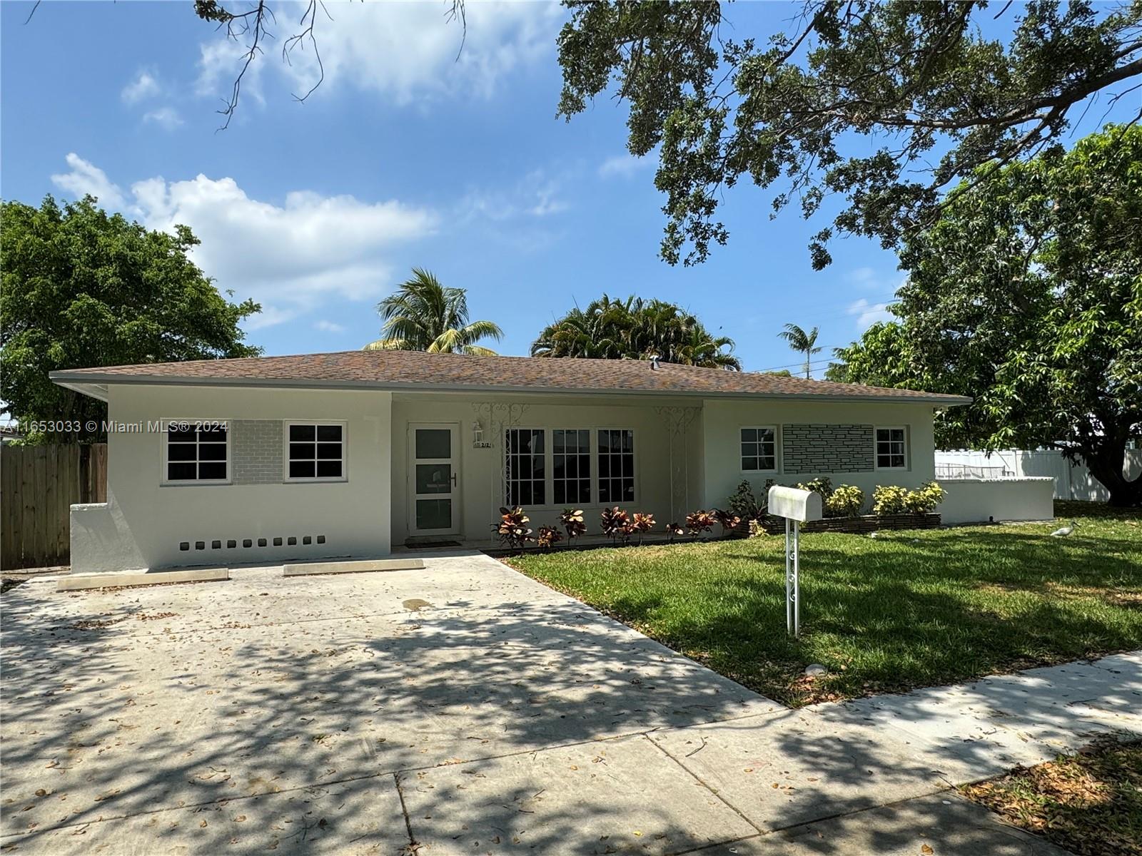 FOR RENT 24 HOUR GAURD GATED COMMUNITY, NEWER KITCHEN , BRAND NEW CENTRAL AIR AND DUCTWORK, ORIGINAL POLISHED TERRAZZO FLOORS, LARGE LOT, MINIMUM 1 YEAR LEASE , all brand new hurricane impact windows and doors,NO SHORT TERM OR ARBNB ALLOWED. CALL TO SEE TODAY.