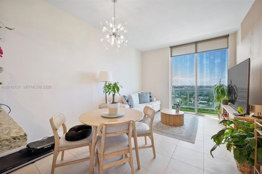 Spacious residence featuring stunning, unobstructed sunset and skyline views. This unit offers 12-ft ceilings, floor-to-ceiling high-impact windows, and a large private terrace—perfect for indoor-outdoor living.  Washer and dryer inside the unit. Enjoy great amenities including pool, spa, fitness center, and more. Ideally located near Brickell, Coral Gables, Key Biscayne, Coconut Grove, beaches, and dining. Unit includes 2 assigned parking spaces. Currently tenant-occupied through July 9, 2026 — perfect opportunity for investors seeking immediate rental income.