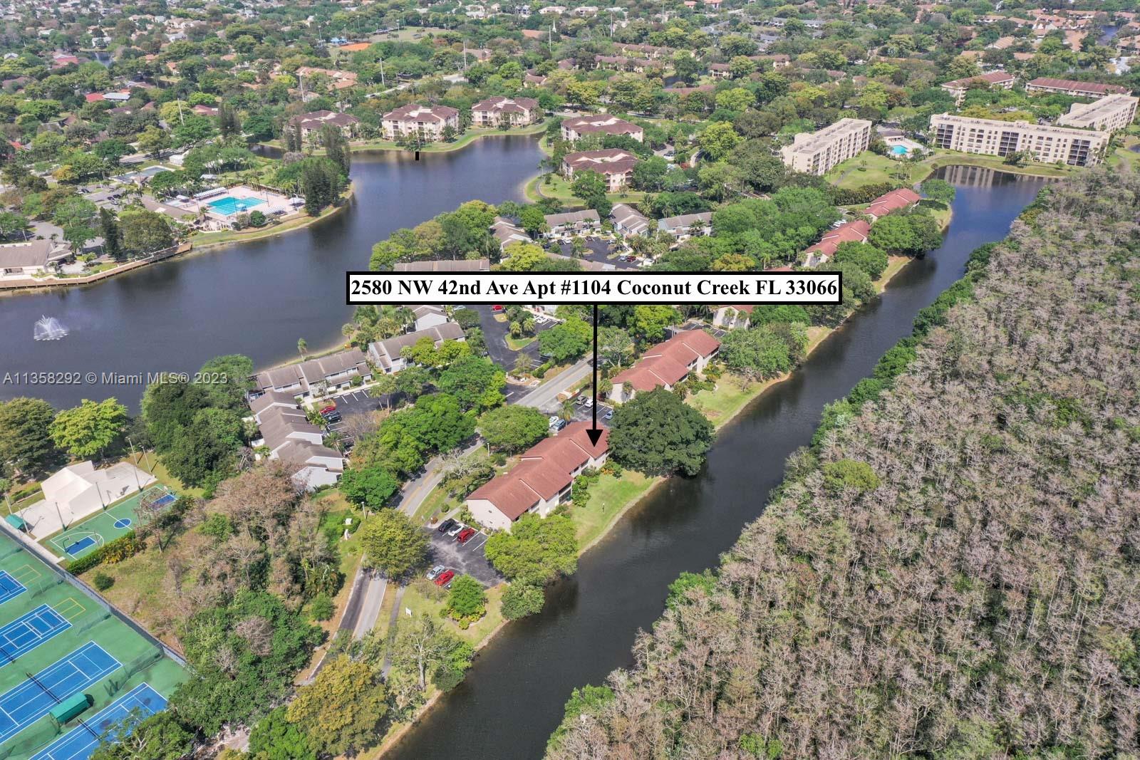 WATERFRONT 1ST FLOOR UNIT WITH AMAZING WATER & PRESERVE VIEWS! The property features a private entrance, front & back patio, 2 bedrooms 2 bathrooms, and laundry in the unit! Modern kitchen with lots of natural light eat-in breakfast area white cabinets & appliances with black granite countertops! The living & dining room is spacious with tile throughout and offers a tranquil view of the lake & preserve! The master bedroom has a large sliding glass door leading out to the screened-in patio, and an ensuite master bathroom with separate vanity & sink area! This building has completed the 40yr inspection! You will love this unit we promise. Check out the virtual tour to see a video walk-through!