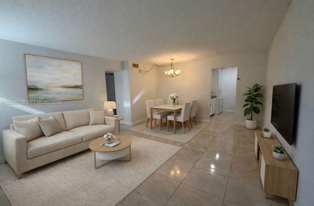 Photo of 9956 Twin Lakes Dr #34-D, Coral Springs, FL 33071 (MLS # A12006738)