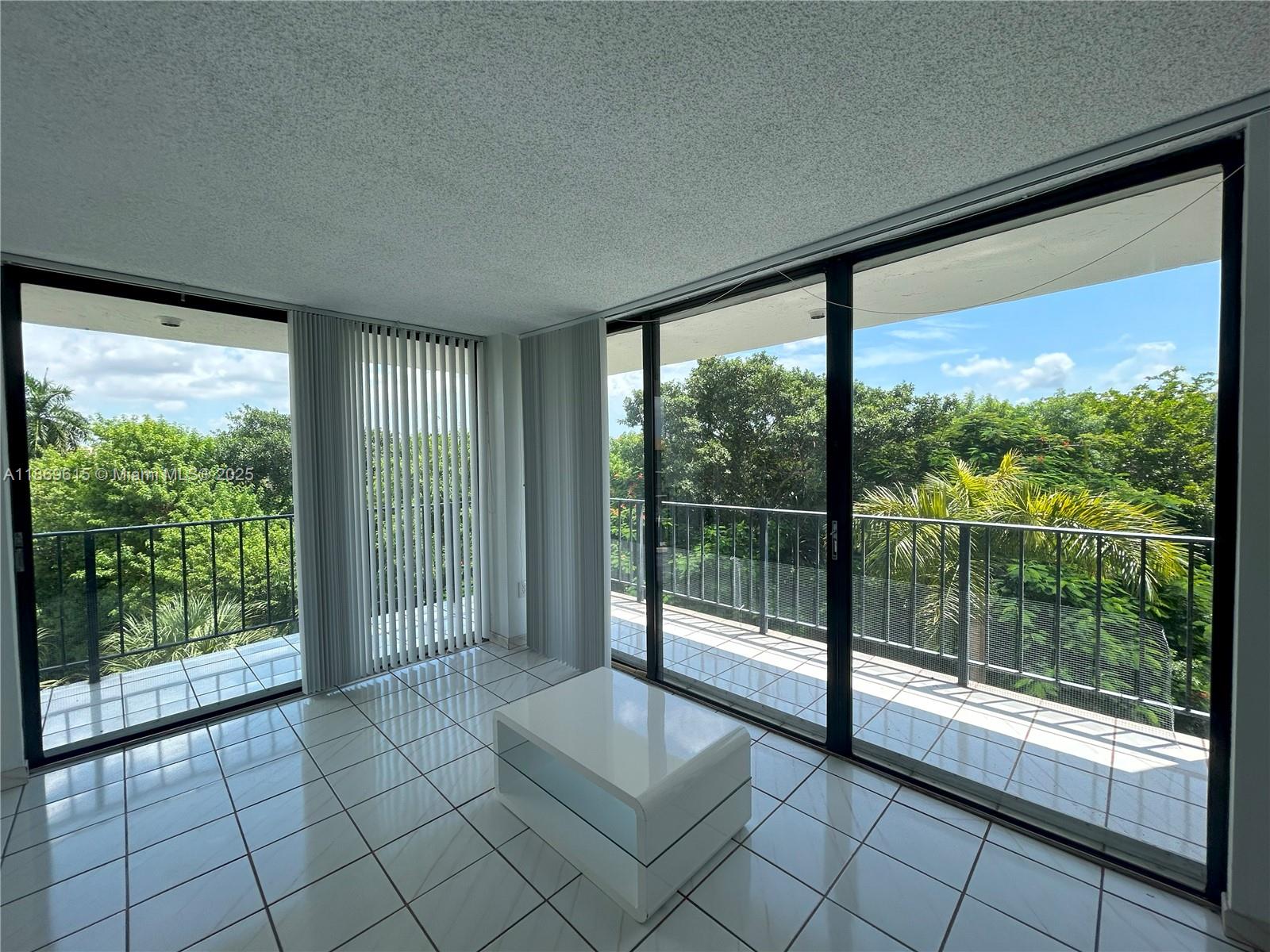 Spacious 2-bedroom, 2-bathroom corner unit offering 1,277 sq. ft., the largest model in the building with 2 assigned parkings. This light-filled residence features a sought-after wraparound balcony, perfect for enjoying panoramic views and outdoor relaxation. Generously sized bedrooms include ample closet space, while the bathrooms are designed for convenience and comfort. With its prime corner location, expansive square footage, and central location in Fontainebleau, this home combines style, space, and functionality in one. Don’t miss the chance to own the largest model—schedule your private showing today! Subject to short sale approval. Please note fridge in kitchen is not included.