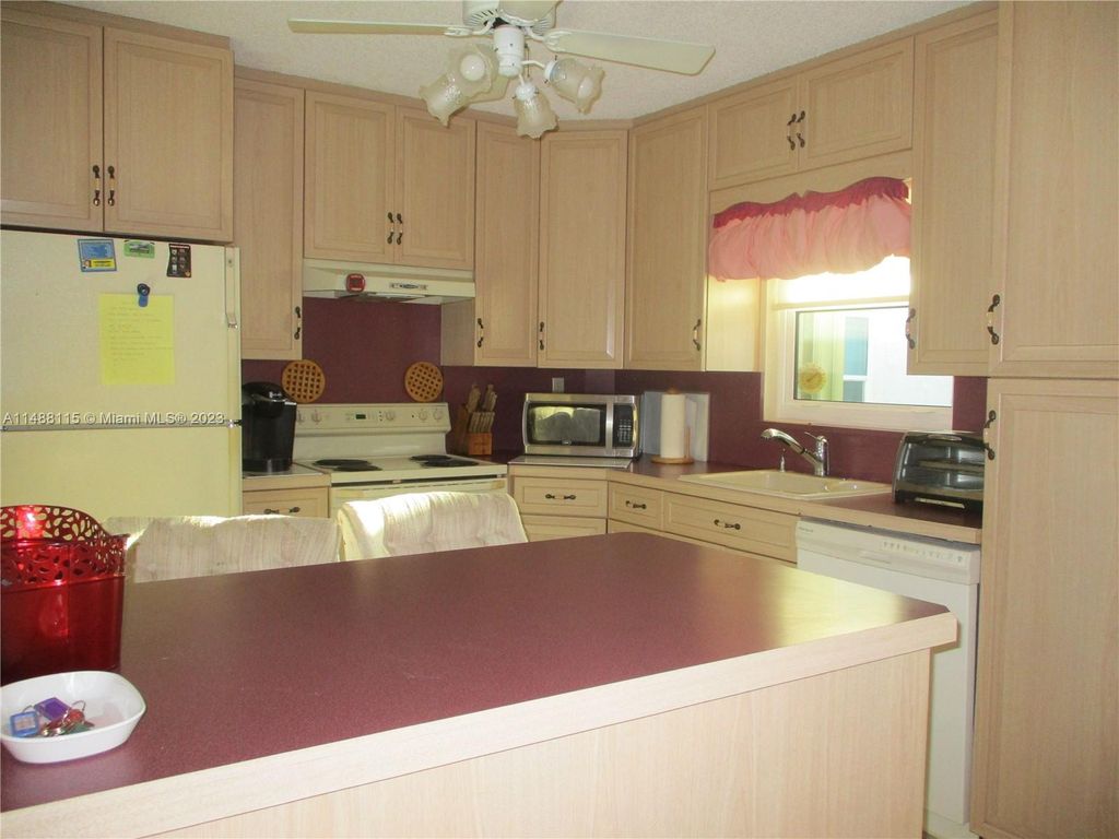 Photo of 6531 SE Federal Hwy #L 106, Stuart, FL 34997 (MLS # A11488115)