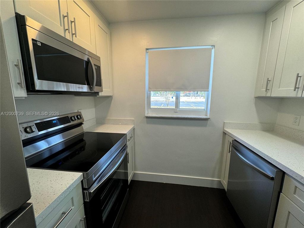 Photo of 4850 SW 26th Ave #1-6, Dania Beach, FL 33312 (MLS # A12000739)