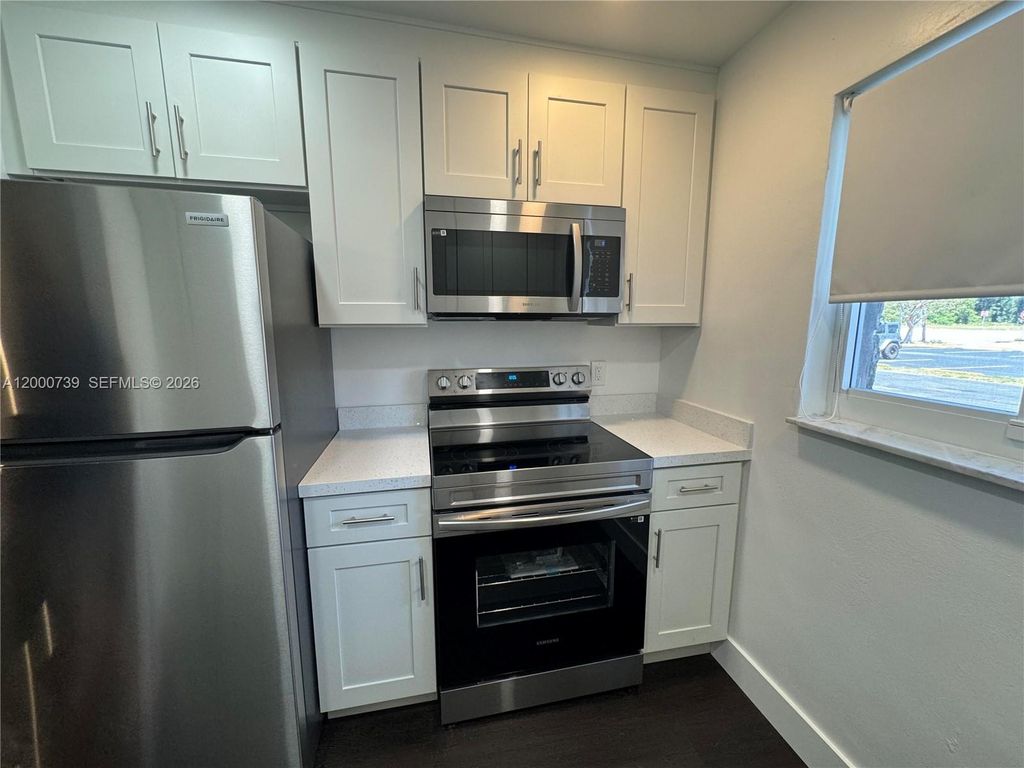 Photo of 4850 SW 26th Ave #1-6, Dania Beach, FL 33312 (MLS # A12000739)