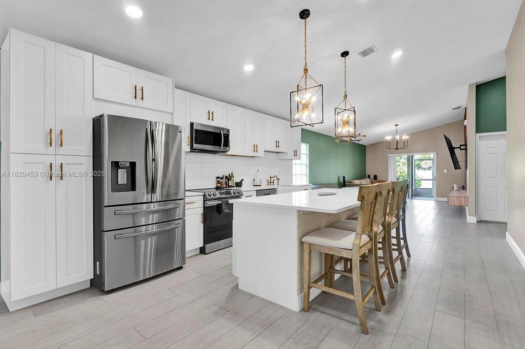 Photo of 142 SW 204th Ave, Pembroke Pines, FL 33029 (MLS # A11820453)