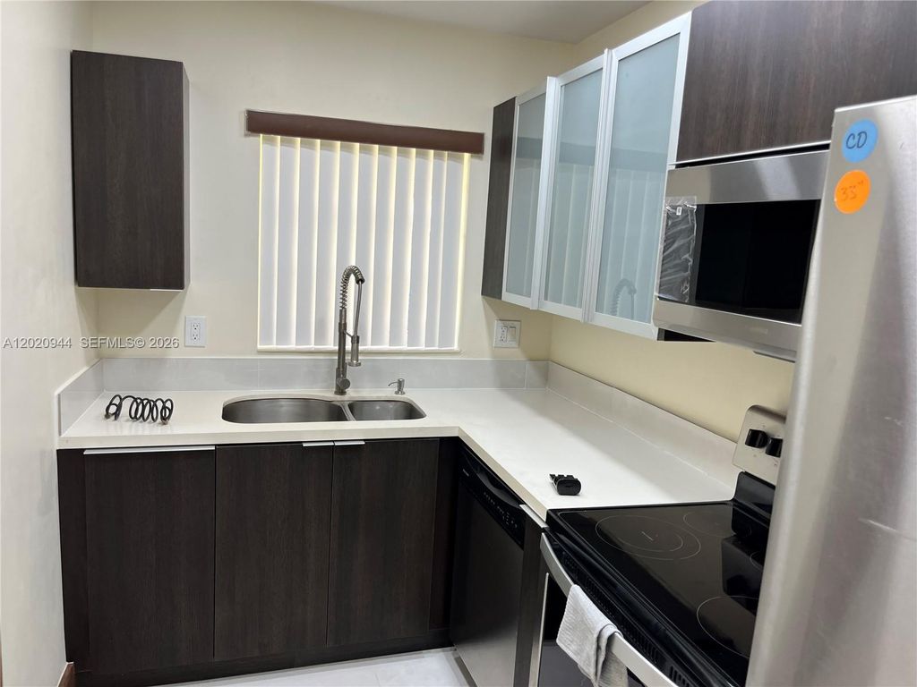 Photo of 2231 NW 9th Pl #H, Fort Lauderdale, FL 33311 (MLS # A12020944)