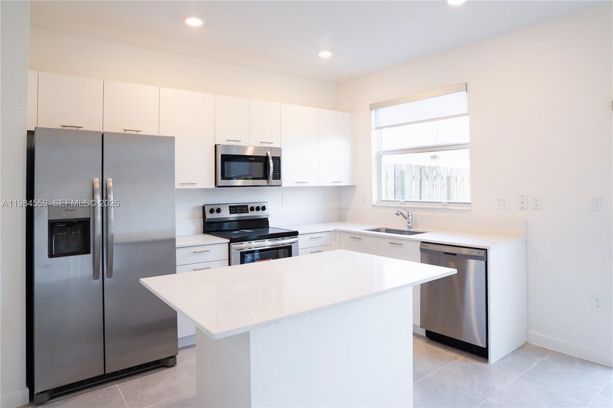 Experience Lux Living in this elegant 3BR/3BA corner townhouse in Miami’s sought-after Westview community. Ideally positioned at the front of the community near the 119th Street entrance and exit, this premium location is gated and offers added convenience and accessibility. Inside, enjoy sleek ceramic tile on the main level, rich laminate flooring upstairs (no carpet), and a designer kitchen with modern finishes. Step outside to a beautifully turfed private backyard—perfect for relaxing or entertaining. Residents also have access to a clubhouse with a pool and a fully equipped gym, enhancing the lifestyle experience. This Townhouse is conveniently located near major highways and Miami’s top destinations. Owner requires only the first month + deposit with excellent credit and strong income. HOA allows a maximum of 2 cars. ACT FAST