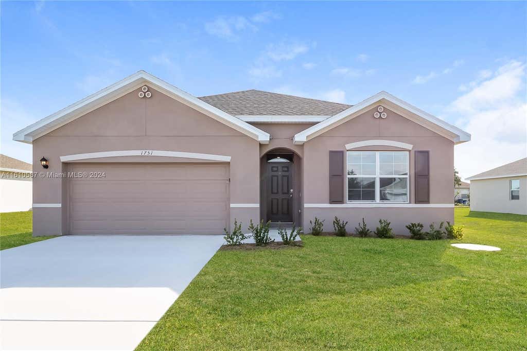 Photo of 1751 SW Gloria Ln, Port Saint Lucie, FL 34953 (MLS # A11610587)