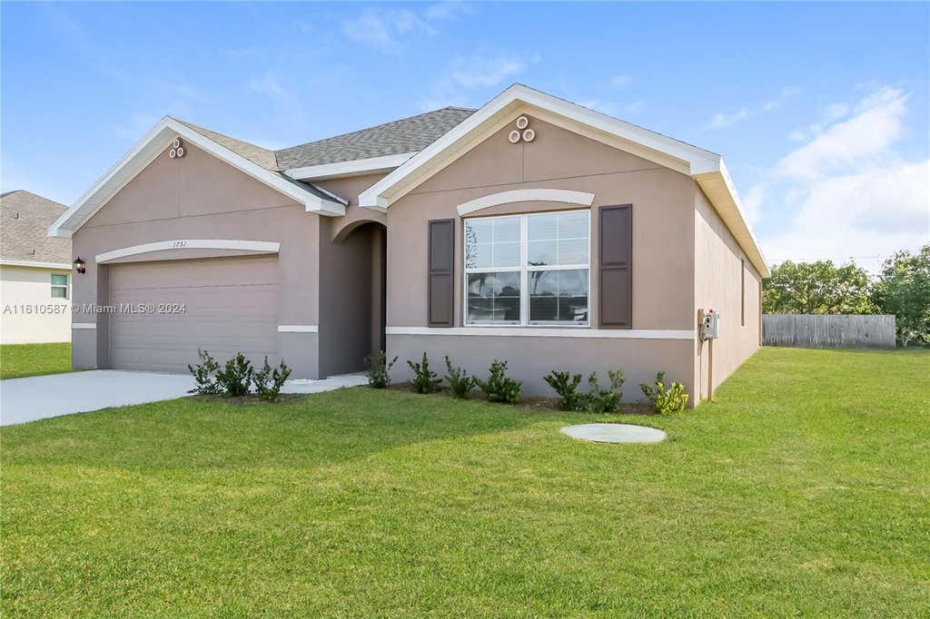 Photo of 1751 SW Gloria Ln, Port Saint Lucie, FL 34953 (MLS # A11610587)