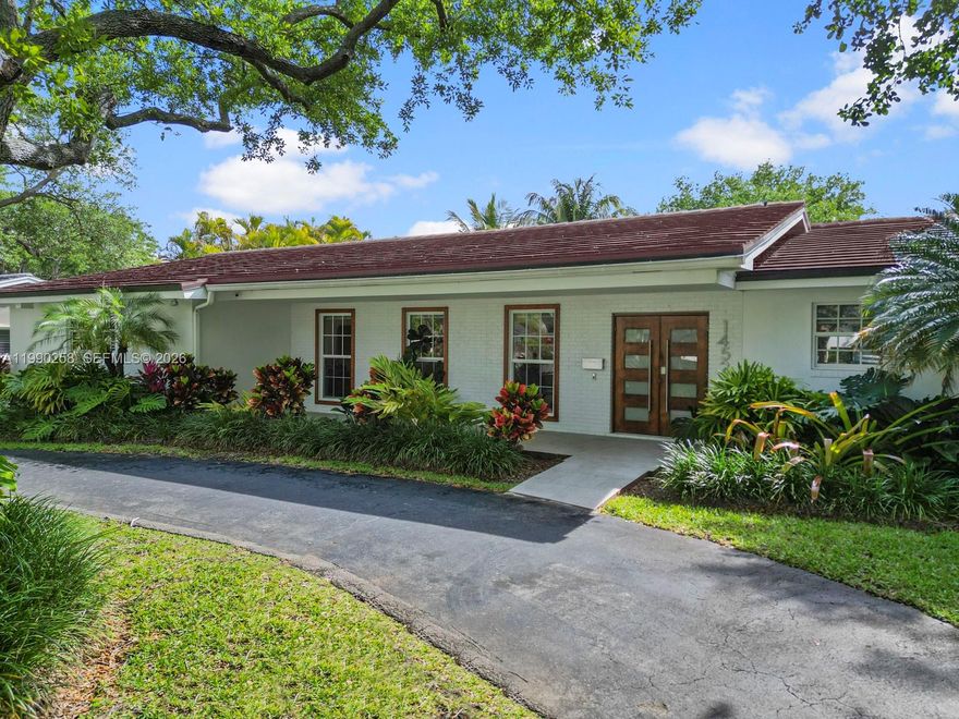 Beautifully updated 4-bedroom, 3-bathroom residence offering 3,928 total square feet on a 17,472 sq ft lot in North Palmetto Bay. Light-filled living areas feature elegant marble flooring throughout. The modern kitchen is equipped with quartz countertops, soft-close cabinetry, and premium appliances, including Miele and Liebherr, along with a reverse osmosis water filtration system.

The primary suite includes two custom walk-in closets and a spacious bathroom with dual rain shower heads, plus an adjacent office/den area overlooking the backyard.

Outdoor features include a covered and screened summer kitchen, heated saltwater pool with children safety fence around it, and ample green space suitable for gatherings and outdoor enjoyment. Additional highlights include impact windows and doors, updated plumbing and electrical systems, and a two-car garage with an electric car charger. Brand new tile roof with 20 years transferable warranty. 

Showings starting on Monday April 27, 2026 by appointment only!