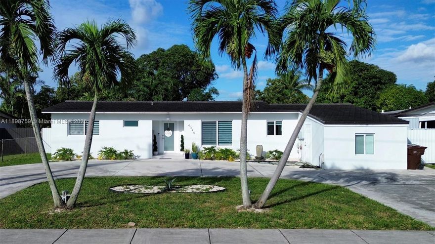 Welcome home to this beautifully remodeled 3-bedroom, 2-bathroom gem offering modern comfort and serene lakefront living. Step inside and fall in love with the open-concept layout, perfect for both everyday living and entertaining. This home has been thoughtfully updated throughout — featuring a brand-new roof, impact windows, and brand-new appliances, including a gas stove, washer, and dryer. The A/C unit is only 5 years old, providing efficiency and peace of mind for years to come. Enjoy your private backyard oasis overlooking a sparkling lake — ideal for relaxing evenings or hosting friends and family. The outdoor pergola and inviting jacuzzi create the ultimate space for entertainment and unwinding after a long day.