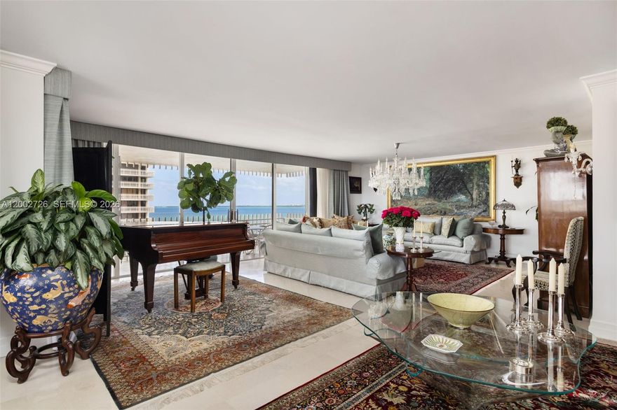 A rare offering in the coveted 09 line at Grove Isle, this beautifully updated 3-bedroom, 2.5-bath residence showcases sweeping water views and refined, light-filled interiors. Expansive living spaces include an oversized living room, family room, formal dining area, and a separate breakfast space designed for both relaxed daily living and elegant entertaining. The private primary suite serves as a tranquil retreat with its own balcony, custom walk-in closet, and a marble-appointed bath with bespoke finishes. Thoughtfully renovated, the home features premium imported wood flooring, a marble kitchen with custom cabinetry, wine refrigeration, and an alkaline water system, along with a dedicated laundry area. Enhanced with designer details, solid-core doors, and sun control film, this residence is set within a guard-gated island community offering resort-style amenities, marina access, and proximity to Coconut Grove’s vibrant dining and lifestyle.