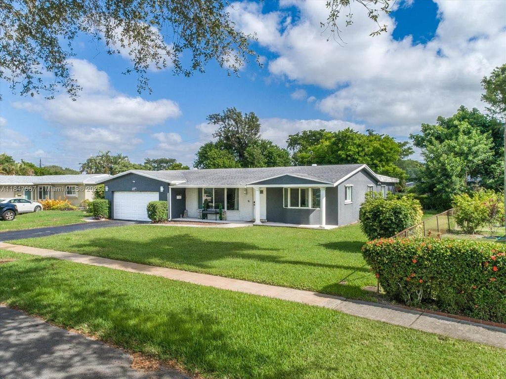 Photo of 4837 NW 8th St, Plantation, FL 33317 (MLS # A11847667)