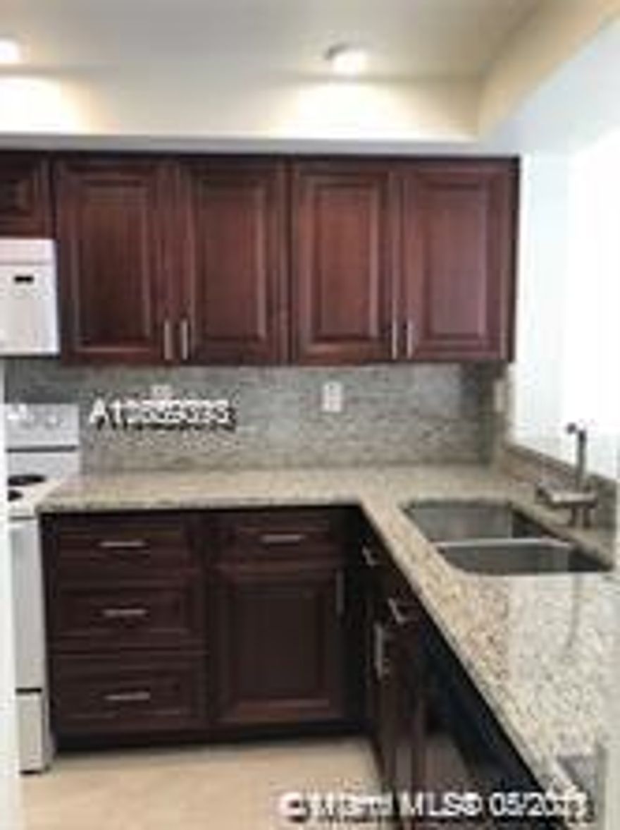 Beautiful 2 Bedroom, 2 1/2 baths. This is a 2-story condo with large, open living and dining areas, beautifully remodeled kitchen with granite countertops, beautiful cabinets and new appliances. There are two spacious screened areas; one as a patio, off the living room, the other, as a balcony, off the master bedroom, with a wonderful view of the garden. Walk-in closets in both bedrooms. Each bedroom has its own bathroom; separate laundry room with a storage area, plus a half bathroom on first floor and much more! Community has large pool with hot tub, clubhouse, and tennis courts. Property is close to Nova University and other schools and colleges. Great local shopping, restaurants and Fort Lauderdale International Airport! - A MUST SEE!