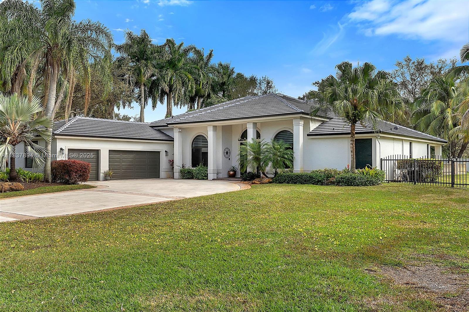 Welcome to your dream oasis! This recently renovated, sprawling residence boasts 5 bedrooms, 3 bathrooms, and
a generous 3-car garage. Indulge in luxury living with a sparkling saltwater pool, perfect for relaxation or
entertaining. Embrace the Florida lifestyle with an outdoor kitchen, ideal for al fresco dining under the stars.
Situated on just over 35,000 square feet of land, enjoy ample space and privacy in this 3,128 square foot
masterpiece. Don't miss the opportunity to make this stunning property your own slice of paradise!